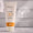 En tub Green People Scent Free Sun Cream SPF30 som står upprätt bredvid ett Dermatologically Tested-sigill.