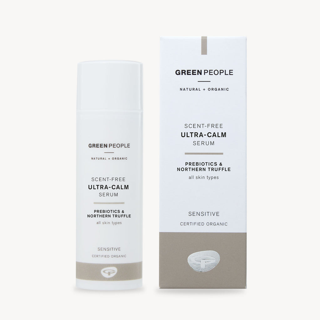 Green People Scent Ultra Calm Serum bottle stands next to its matching white and grey packaging box.