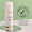 Vit flaska med Green People Scent Free Cleanser på en rund spegel mot en grön bakgrund med ett sigill för dermatologiskt testad.
